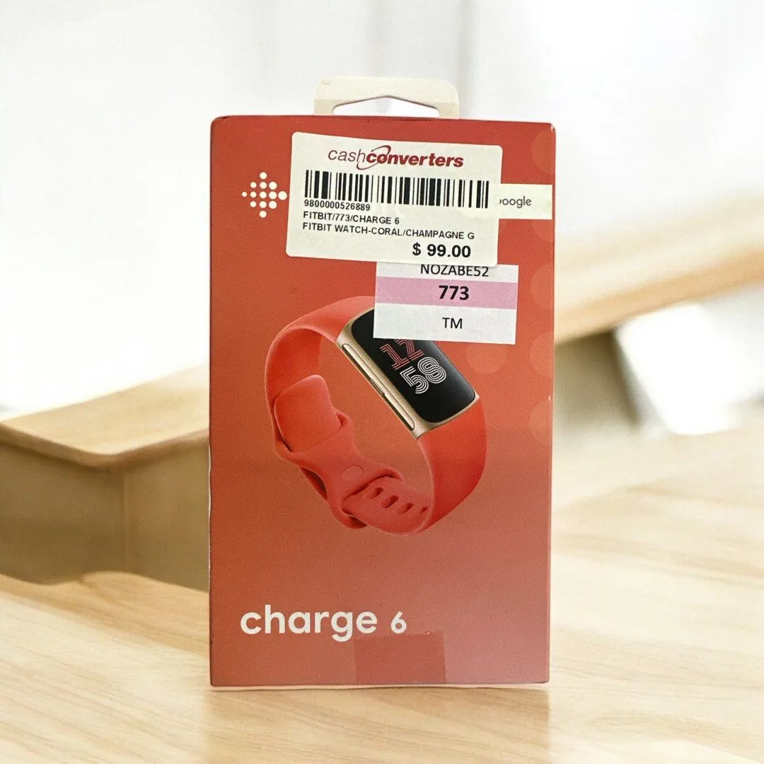 Fitbit Charge 6, Coral/Champagne Gold