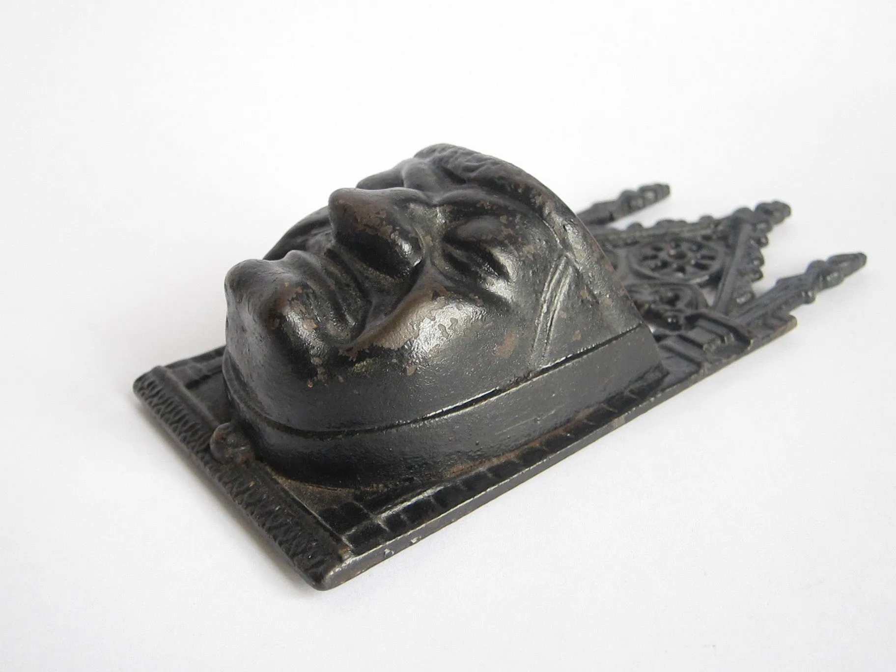 Victorian Cast Iron Grumpy Face Match Holder