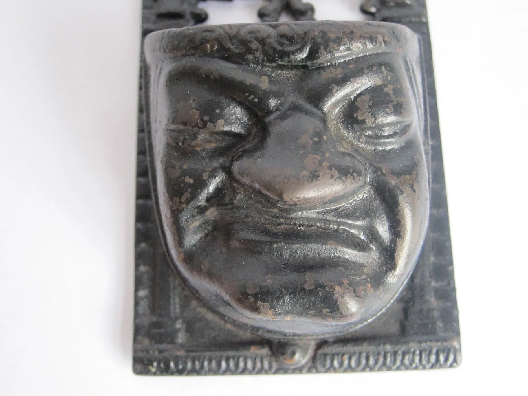 Victorian Cast Iron Grumpy Face Match Holder