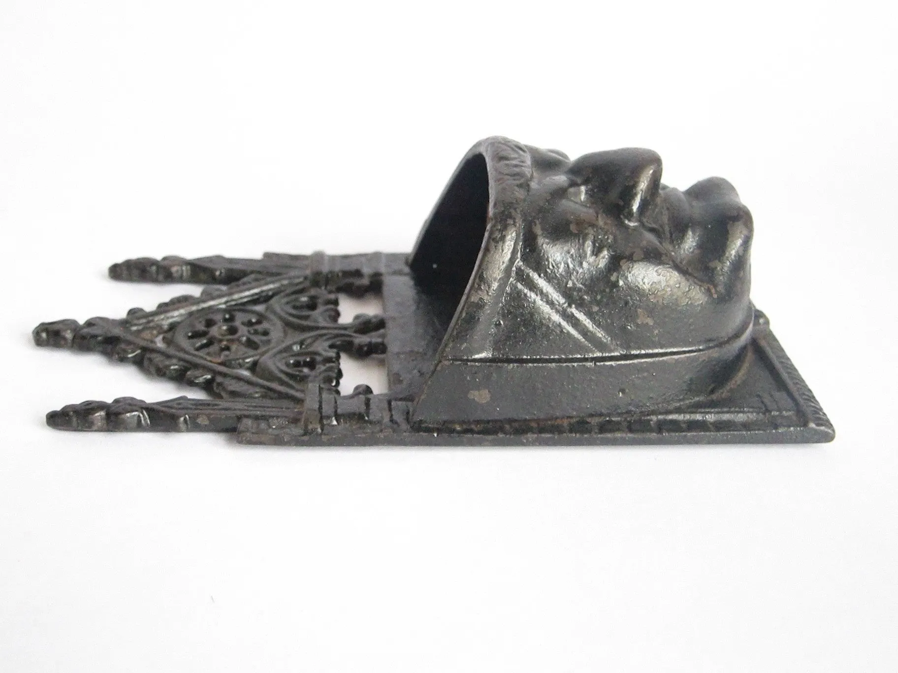 Victorian Cast Iron Grumpy Face Match Holder
