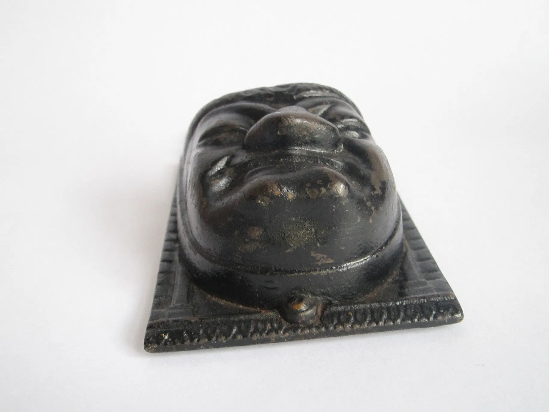 Victorian Cast Iron Grumpy Face Match Holder