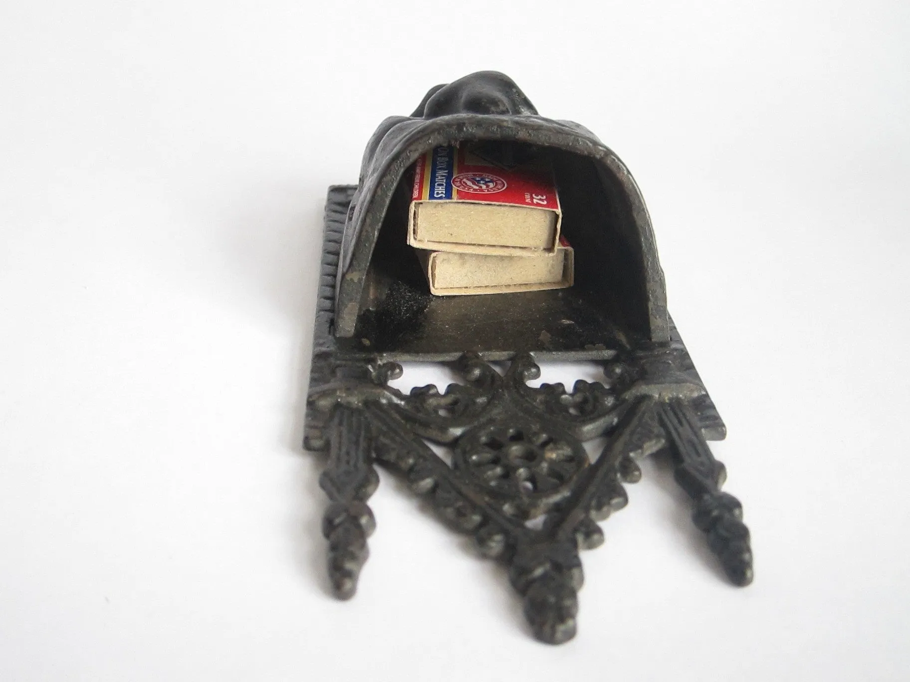 Victorian Cast Iron Grumpy Face Match Holder