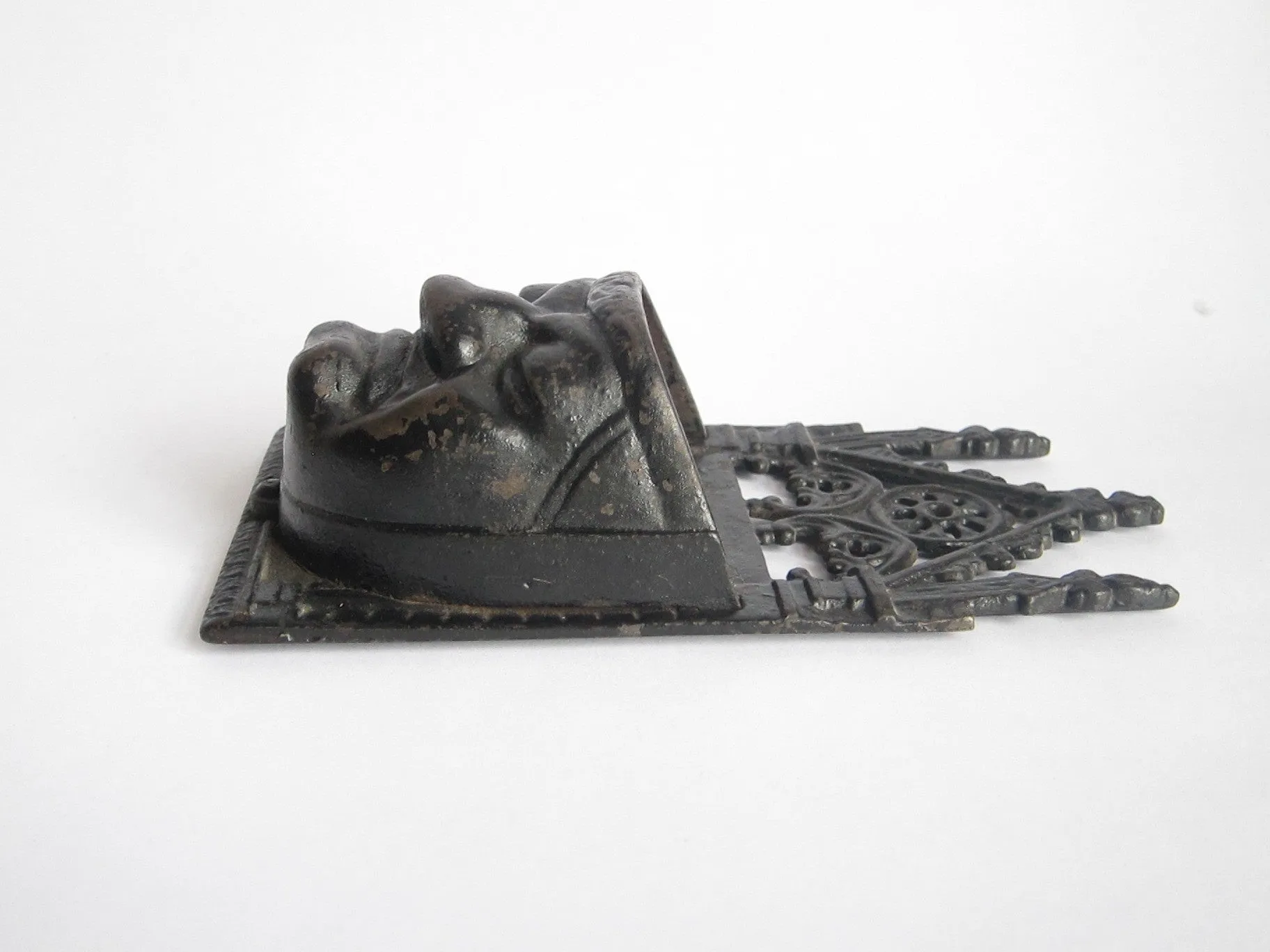 Victorian Cast Iron Grumpy Face Match Holder